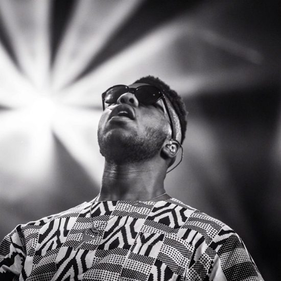 mnek-bw-print-outfit-on-stage