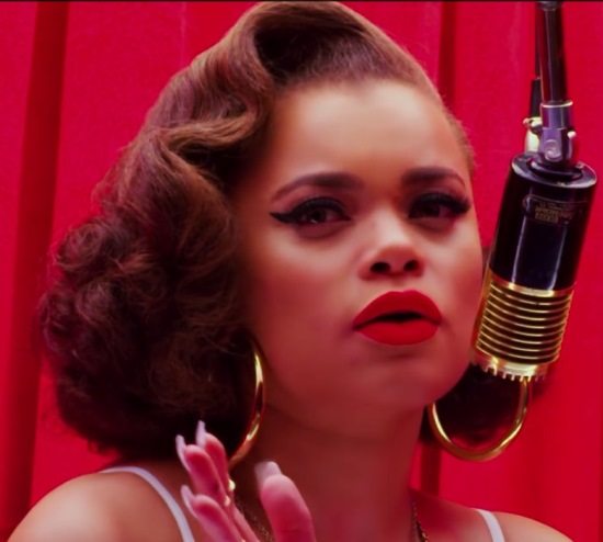 andra-day-forever-mine-video-still-red-velvet-curtain-red-matte-lipstick-winged-eyeliner-gold-hoops-gold-microphone
