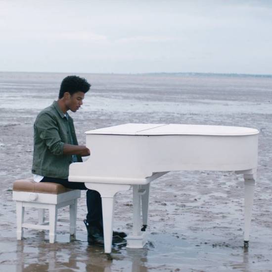kyan-sometimes-music-video-still-white-grand-piano-beach