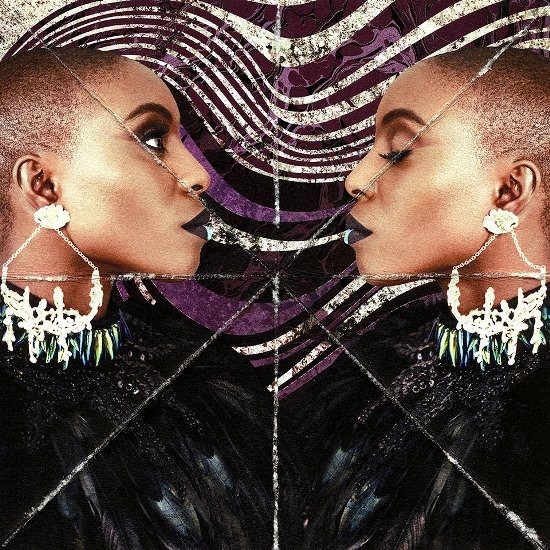 laura-mvula-mirror-effect-feathers-chandelier-earrings-purple-background